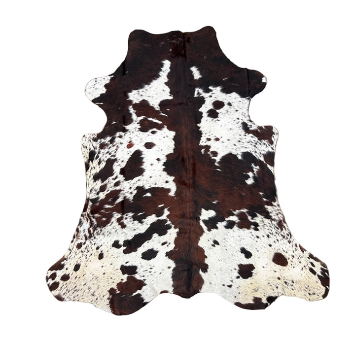 Cowhide rug with brown and white