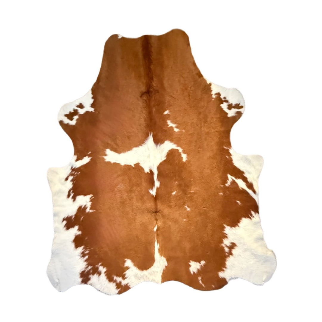 Brown and white cowhide rug small