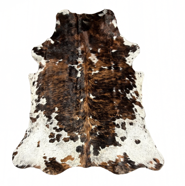 Brown white and black cowhide rug