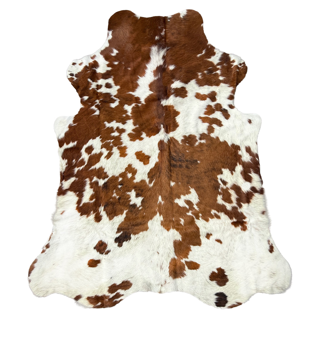 Brown and white cowhide rug 