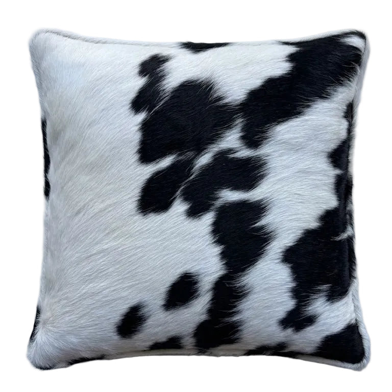 Black and white cowhide cushion. 