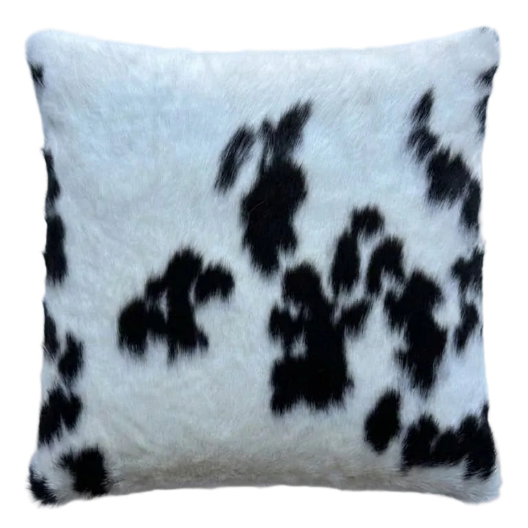 Black and white cowhide cushion. 