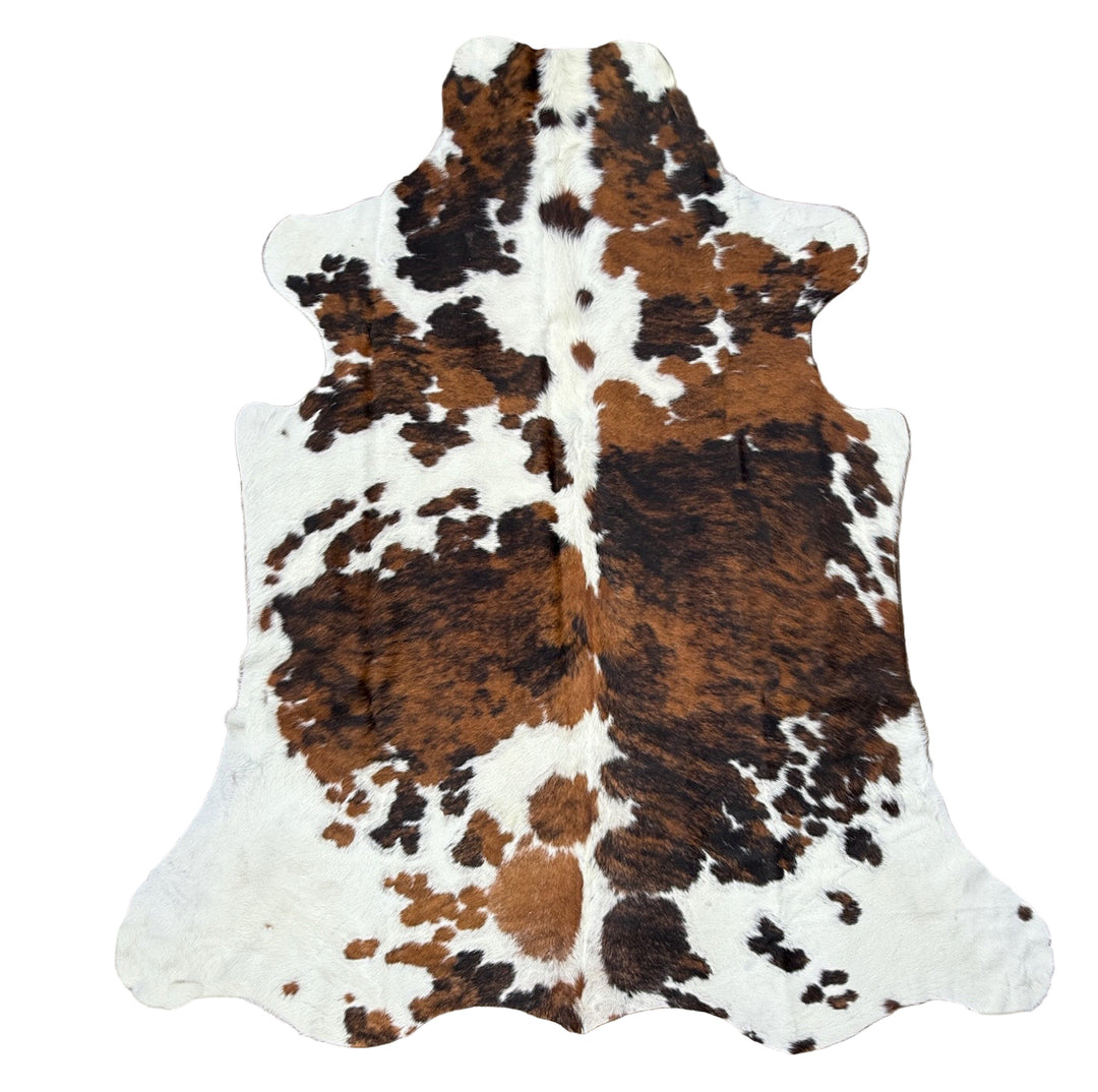 Cowhide rug with brown and white 