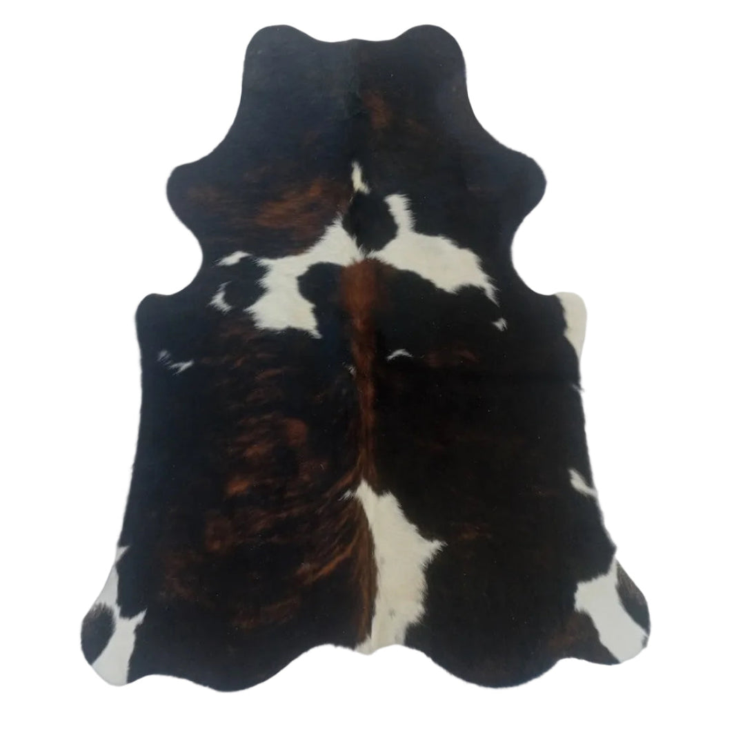 Premium cowhide rug from Cowhide-Rugs-London, 159cm x 130cm, showcasing natural cowhide with unique patterns and textures.