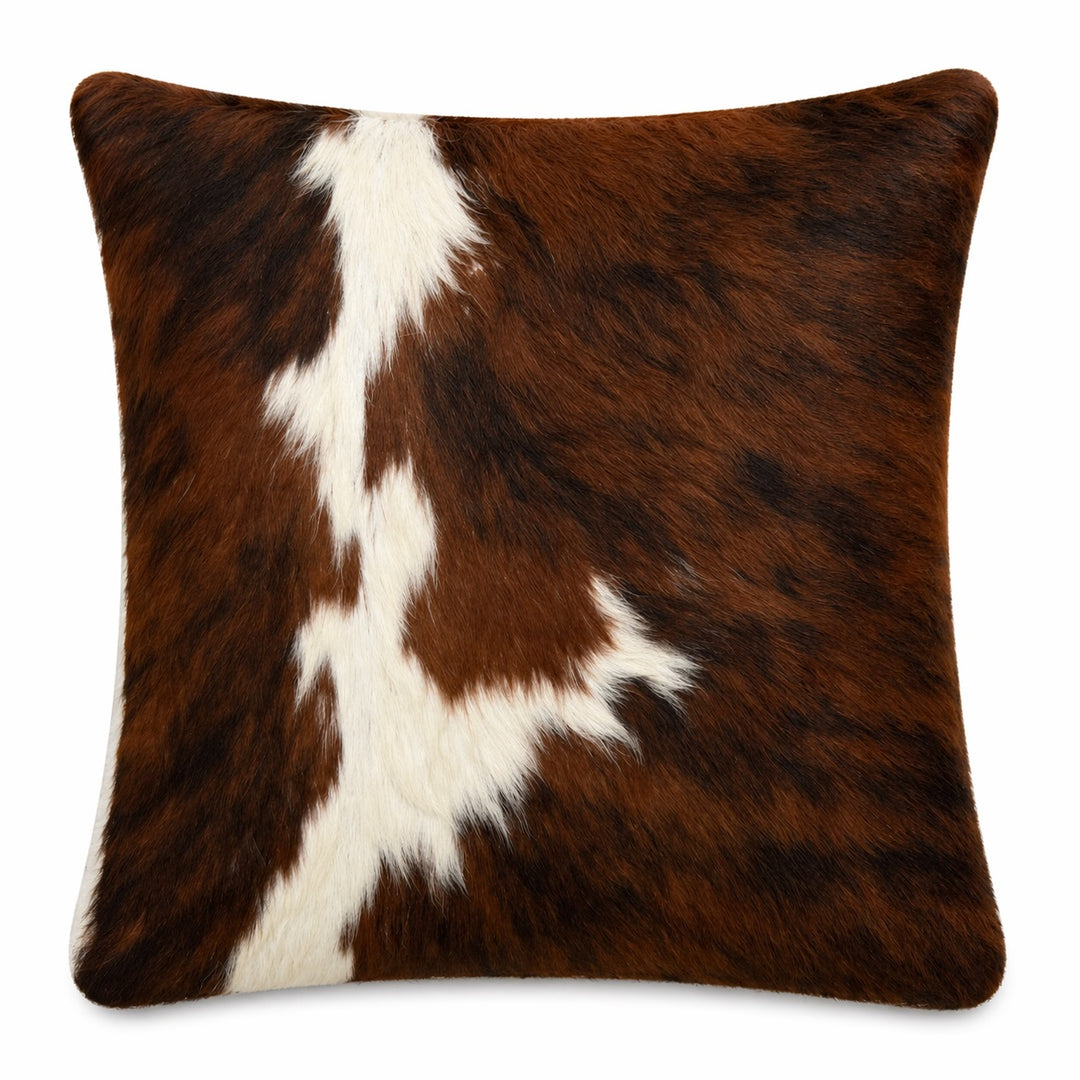 Cowhide cushion from Cowhide Rugs London, 39cm x 39cm, featuring natural cowhide pattern on both sides, decorative and durable.