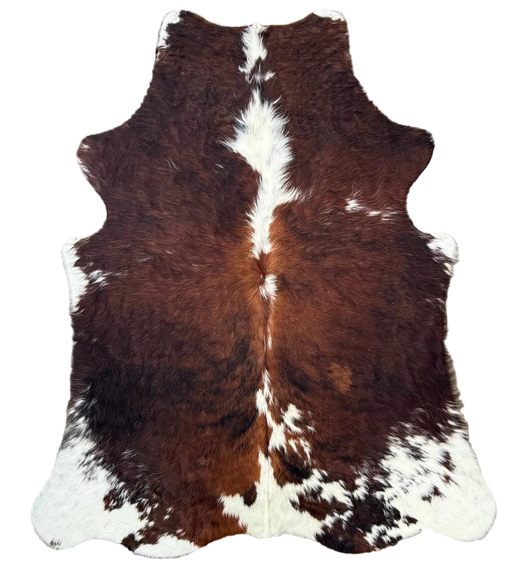 Brown and white cowhide rug 