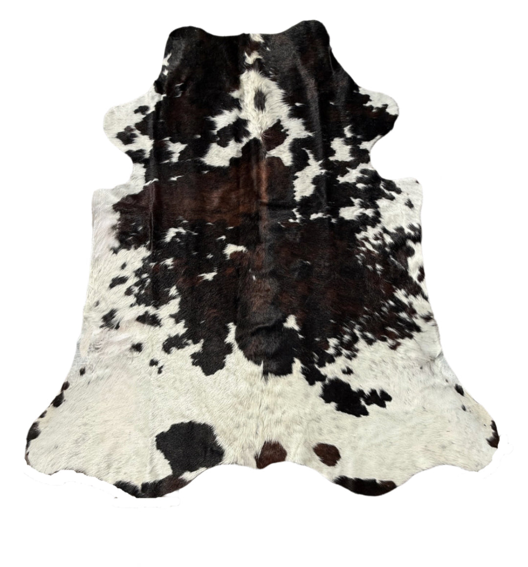 Black and white cowhide rug touch of brown