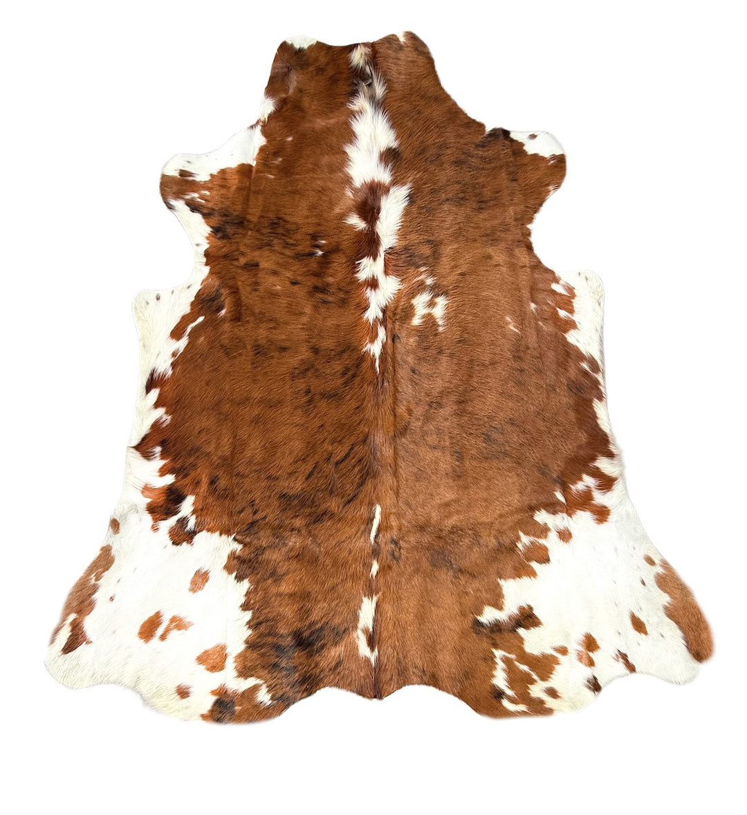 Brown and white cowhide rug 