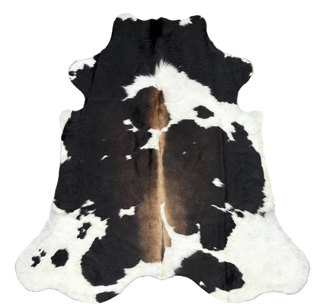Black and white cowhide rug o