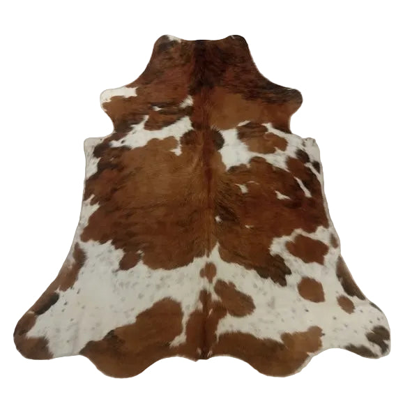 Premium cowhide rug from Cowhide Rugs London, 200cm x 180cm, natural cowhide with unique pattern and soft texture.