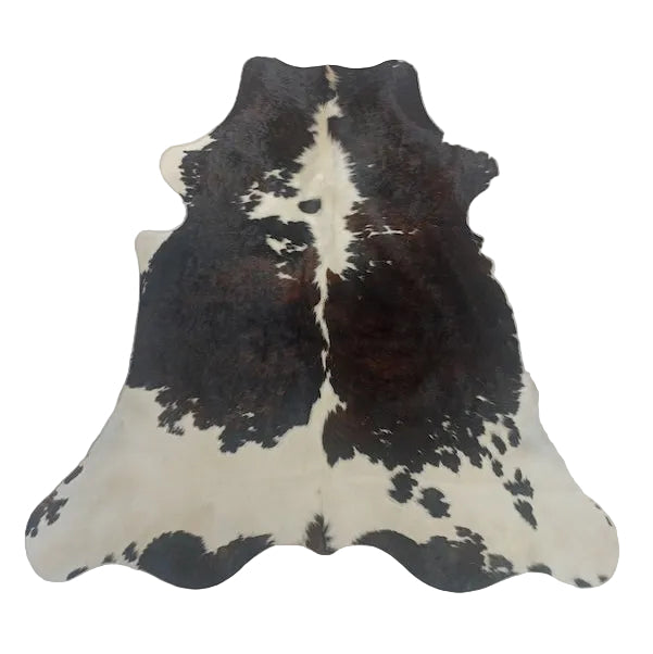 Premium cowhide rug from Cowhide Rugs London, 195cm x 190cm, natural brown and white cowhide pattern.