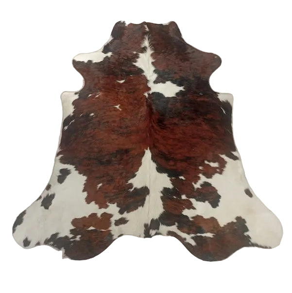 Premium cowhide rug from Cowhide Rugs London, 192cm x 180cm, natural cowhide with distinctive pattern and soft texture.