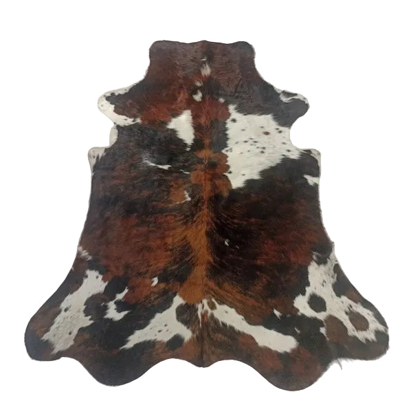 Premium cowhide rug from Cowhide Rugs London, natural brown and white hide with a smooth, irregular pattern, measuring 199cm by 167cm.