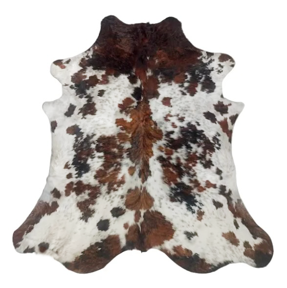 Brown and white cowhide rug 