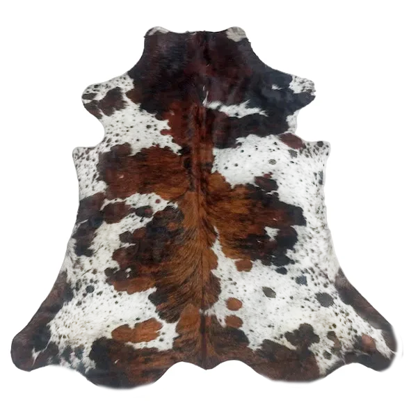 Cowhide rug with brown, black, and white 