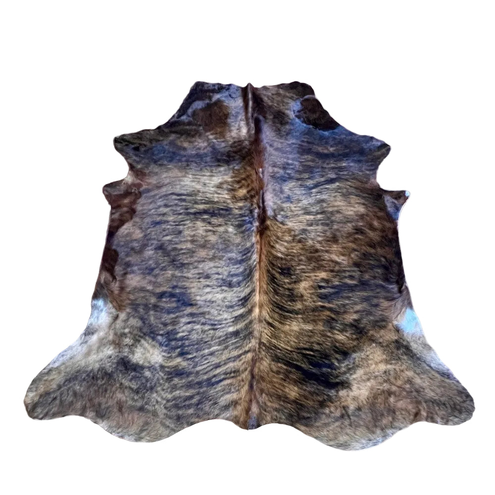 Large cowhide rug by Cowhide Rugs London, natural brown and white cowhide with distinctive pattern, measuring 205cm by 186cm.