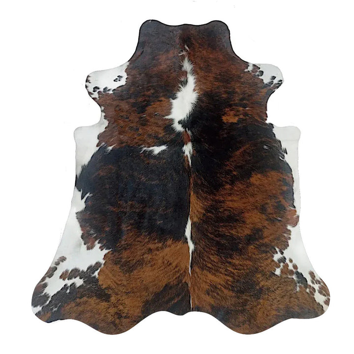 Large cowhide rug from Cowhide Rugs London showcasing natural cowhide pattern, measuring 230cm by 203cm, premium quality.