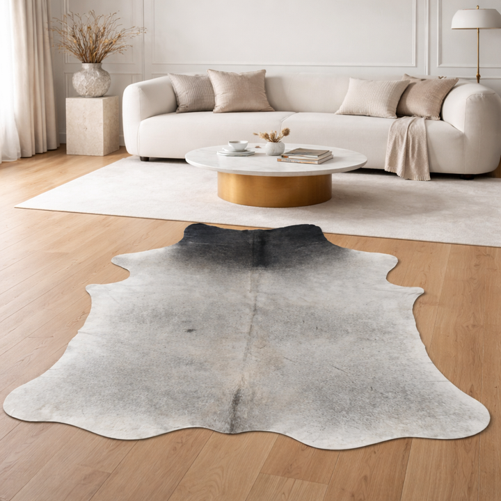 Large premium cowhide rug from Cowhide Rugs London, 245cm x 212cm, natural cowhide texture and pattern.