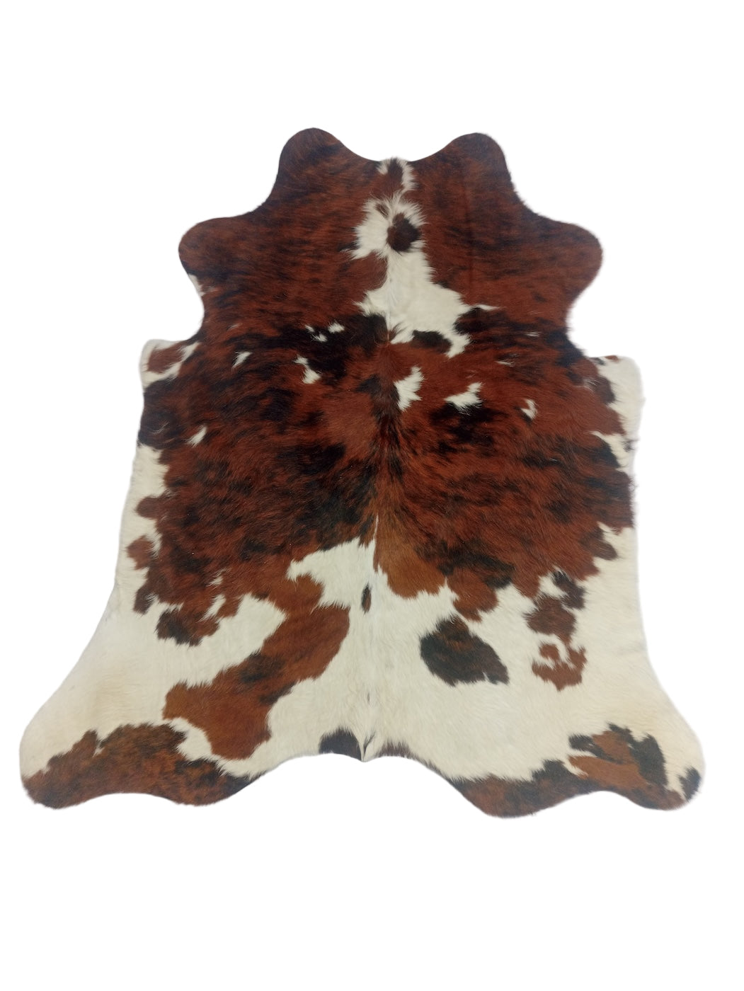 Cowhide rug with brown and white pattern 