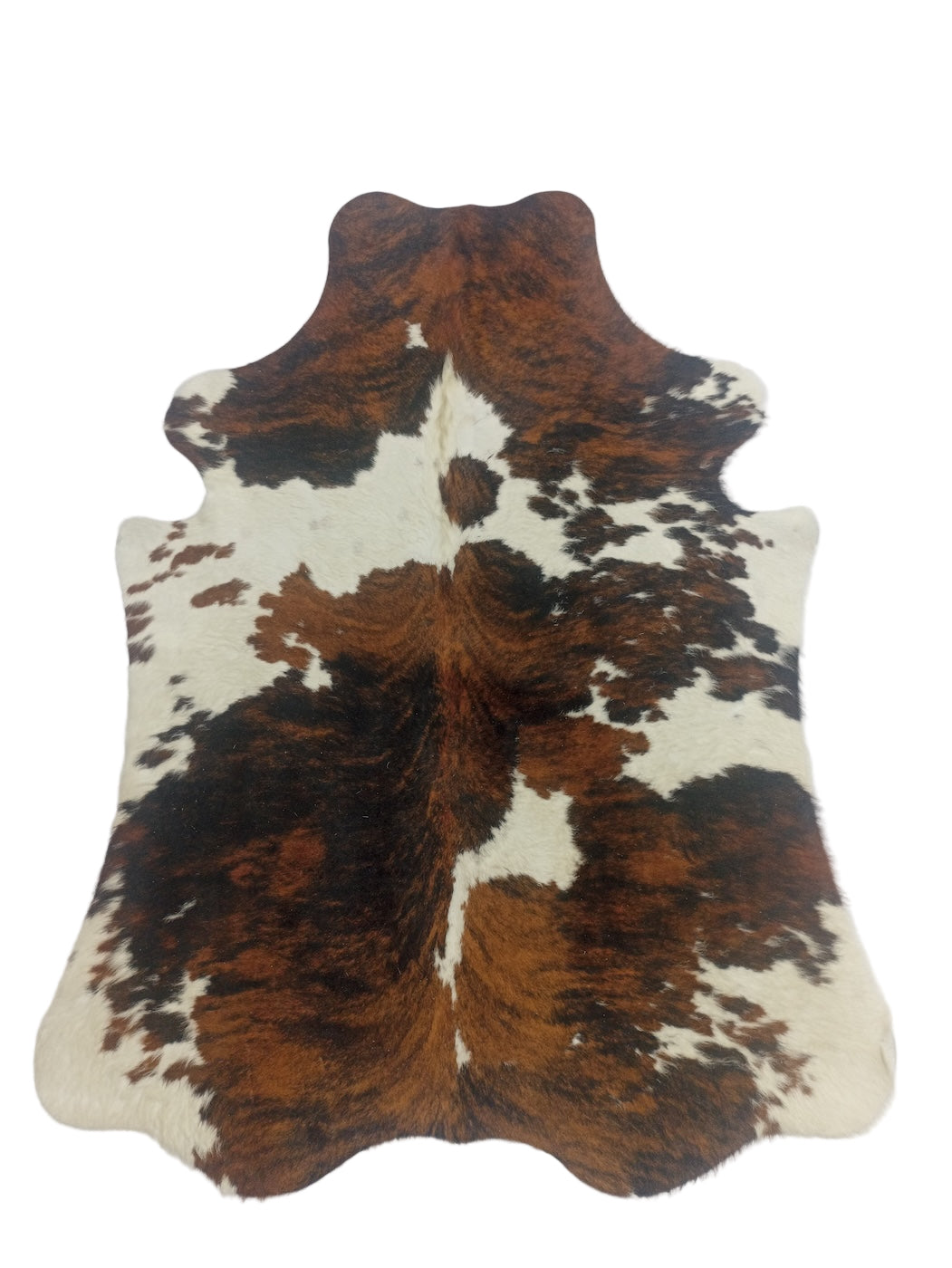 Brown and white cowhide rug 