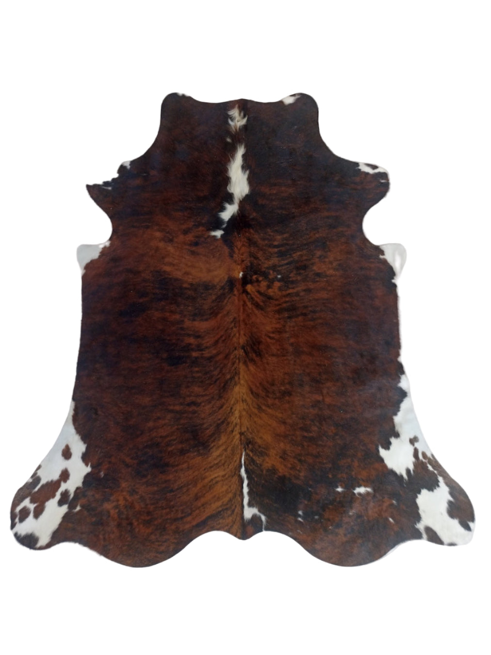 Brown and white cowhide rug 