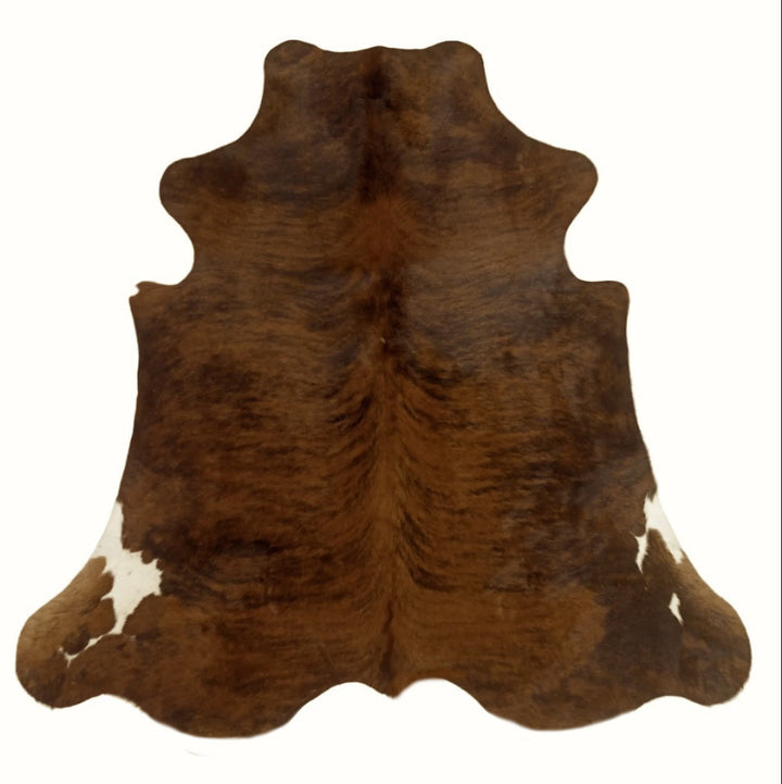 Large premium cowhide rug by Cowhide Rugs London, 242cm x 227cm, featuring natural cowhide pattern and rich textures.