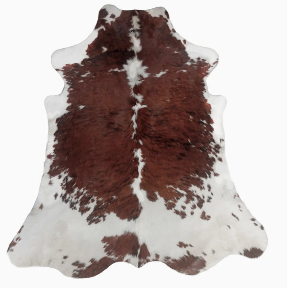 Large premium cowhide rug from Cowhide Rugs London, natural cowhide pattern, measuring 237cm by 200cm, luxurious and durable.