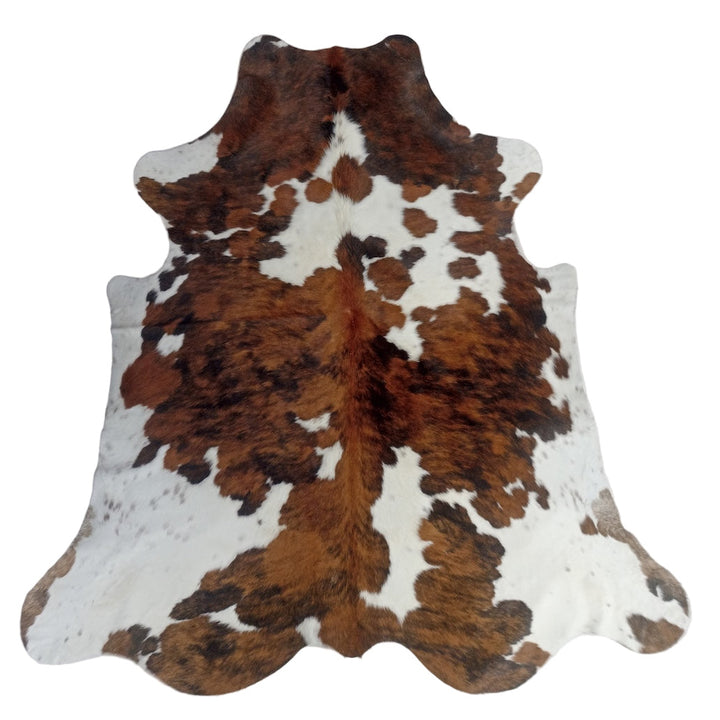 Large premium cowhide rug by Cowhide Rugs London, 230cm x 207cm, showcasing natural cowhide pattern and texture.