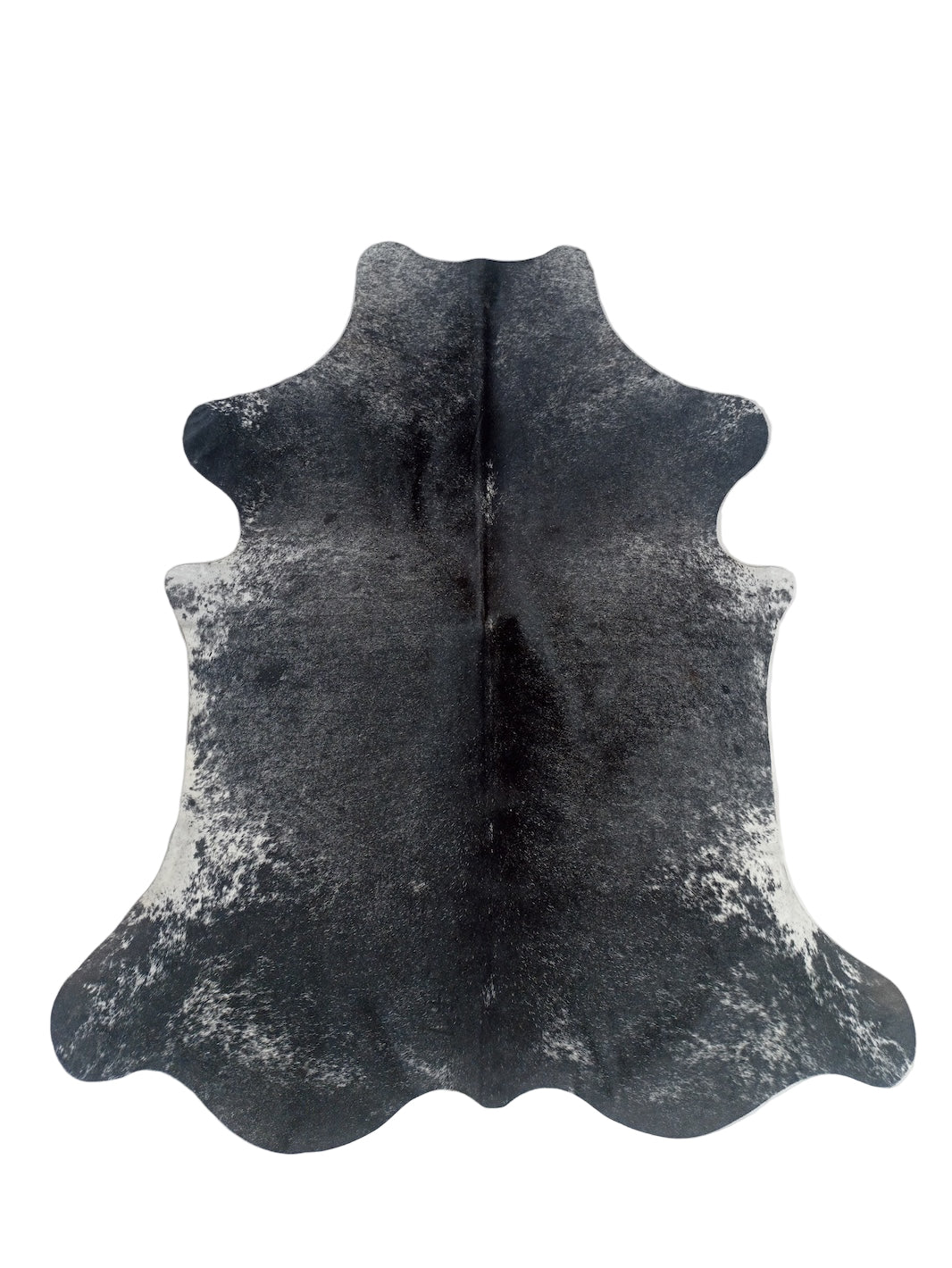 Black cowhide rug on a white 