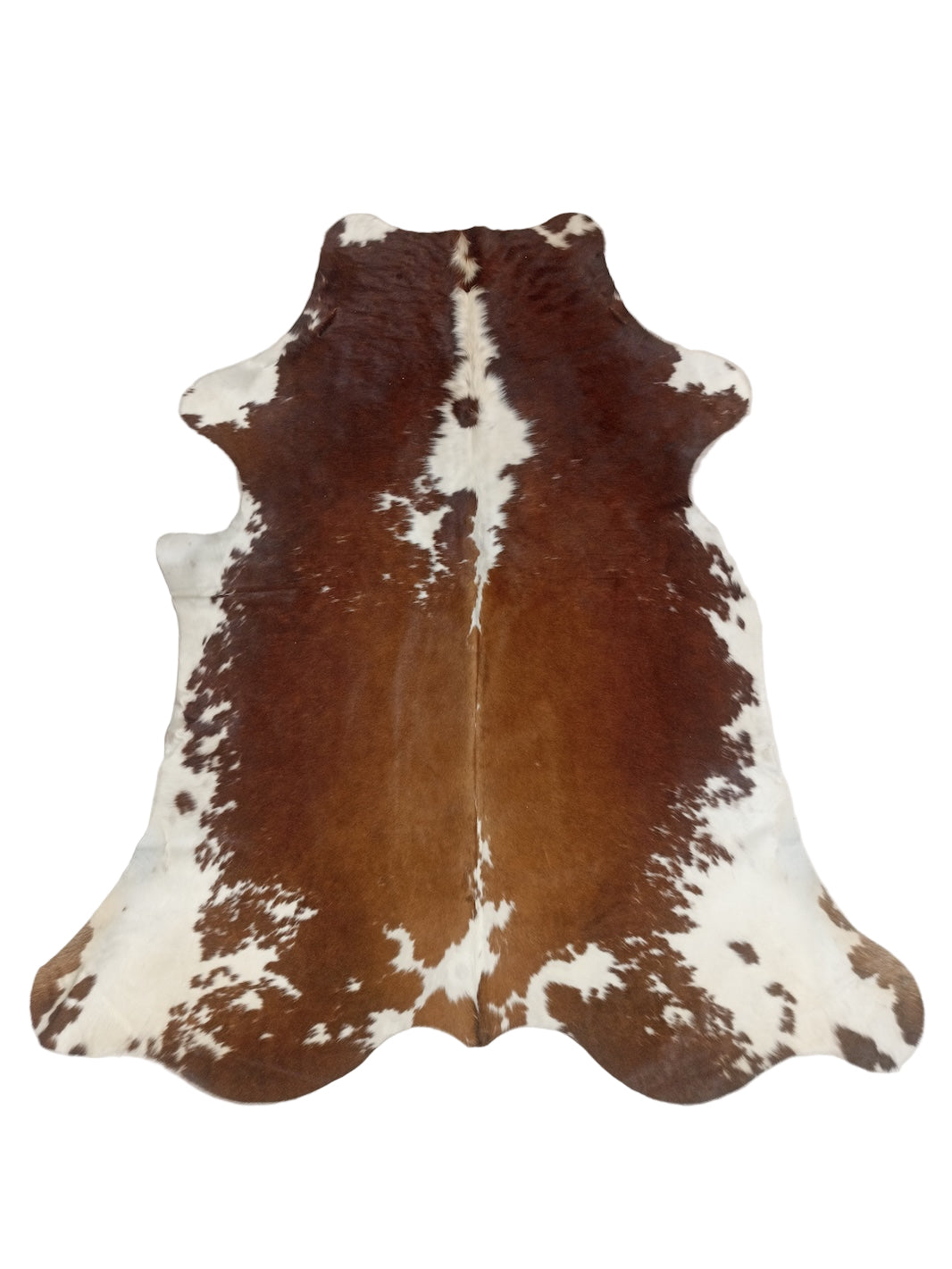 Brown and white cowhide rug 