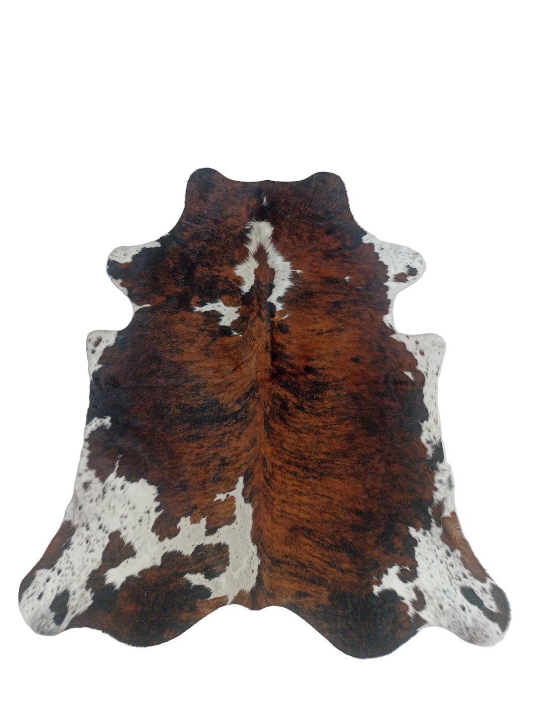 Brown and white cowhide rug 