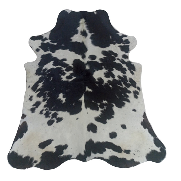 Black and white cowhide rug