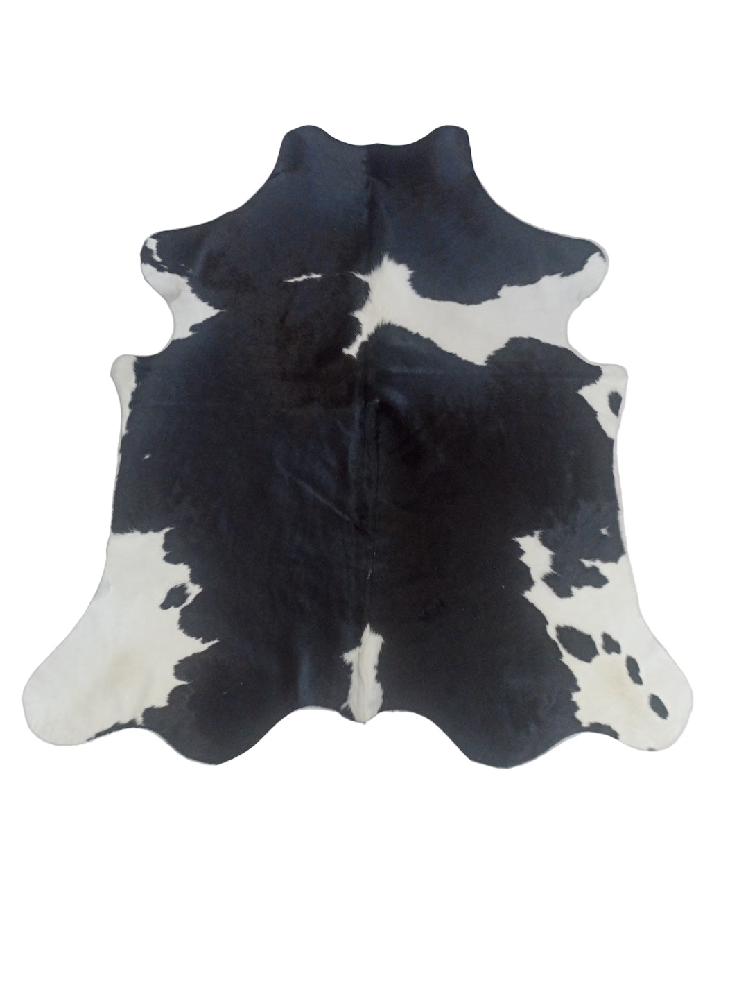 Black and white cowhide rug