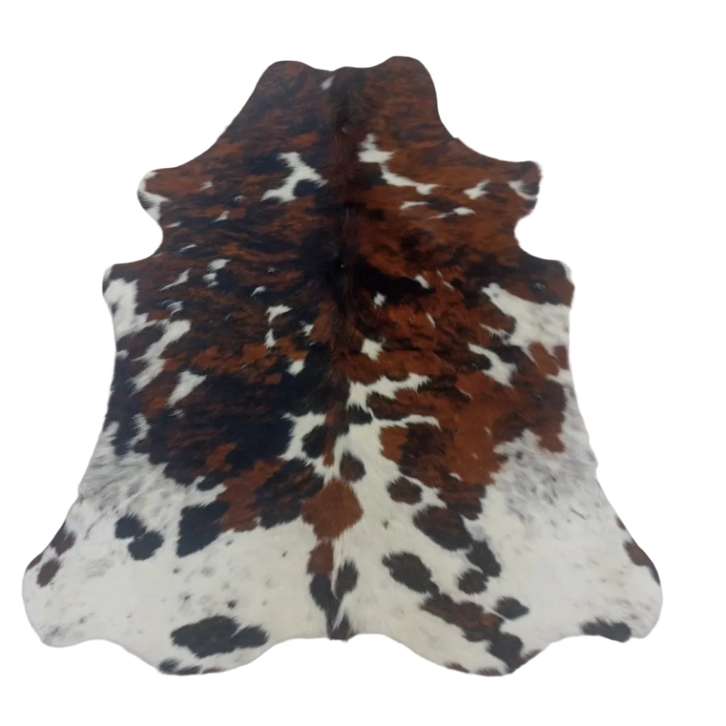 Cowhide rug with brown, black, and white pattern 