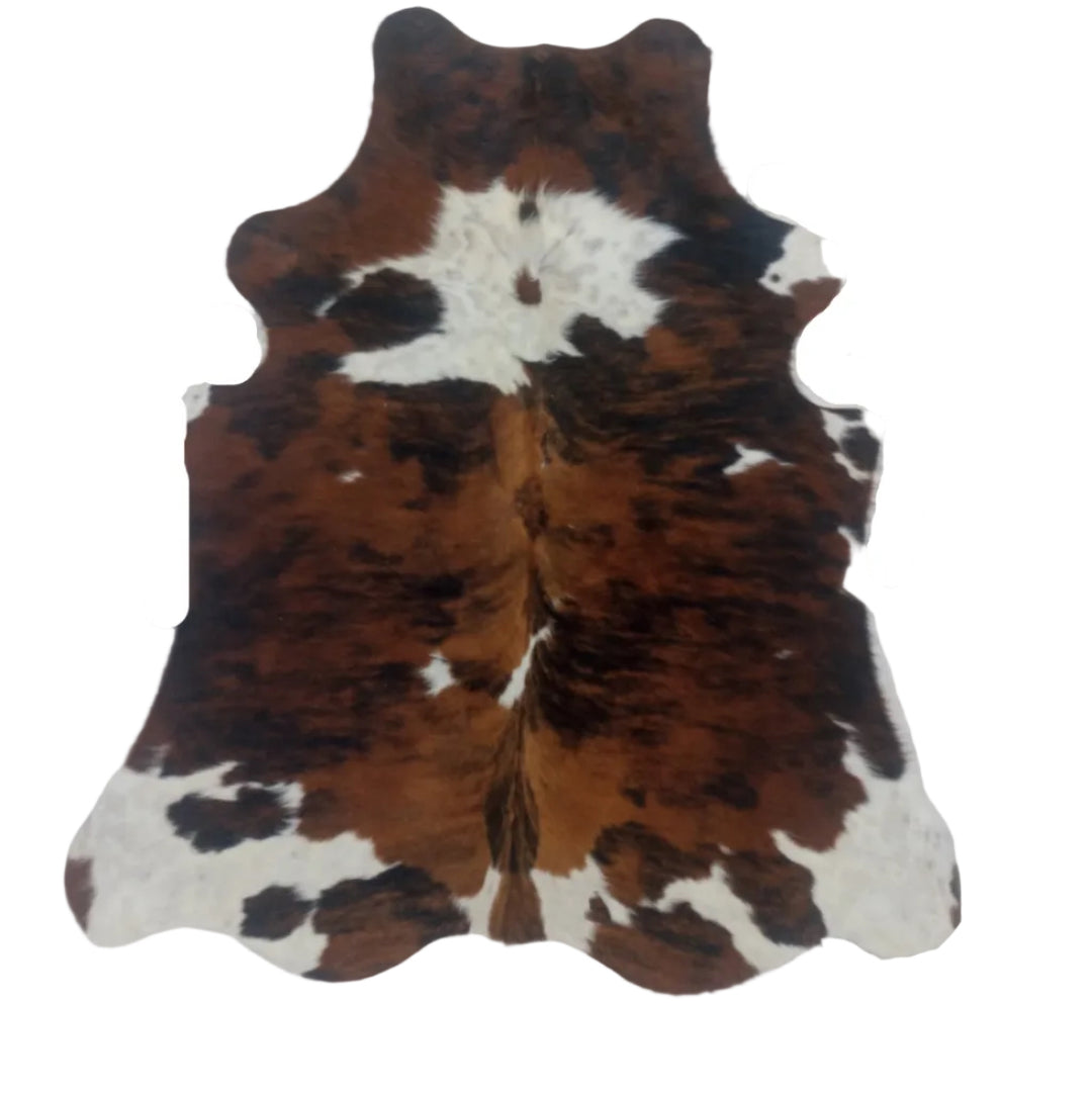 Cowhide rug with brown, black, and white pattern 