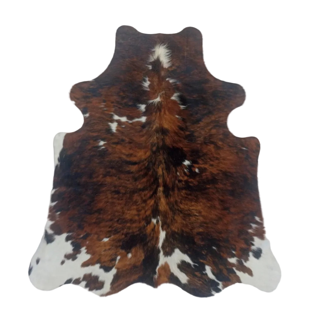 Cowhide rug with brown, white, and black pattern 