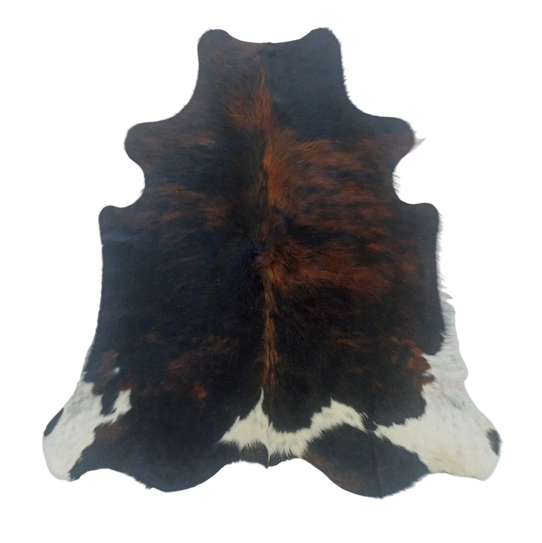 Cowhide rug with black, brown, and white 