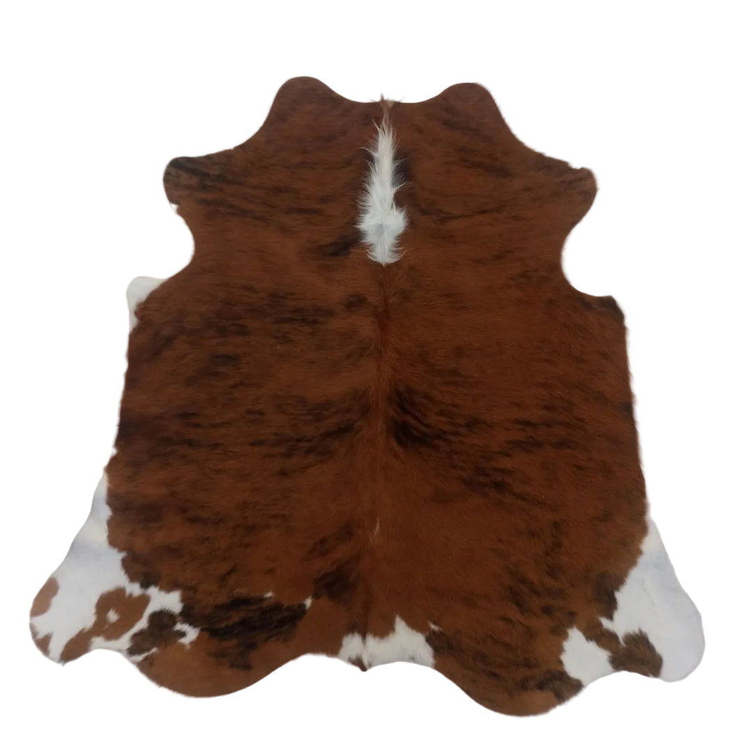 Brown and white cowhide rug 