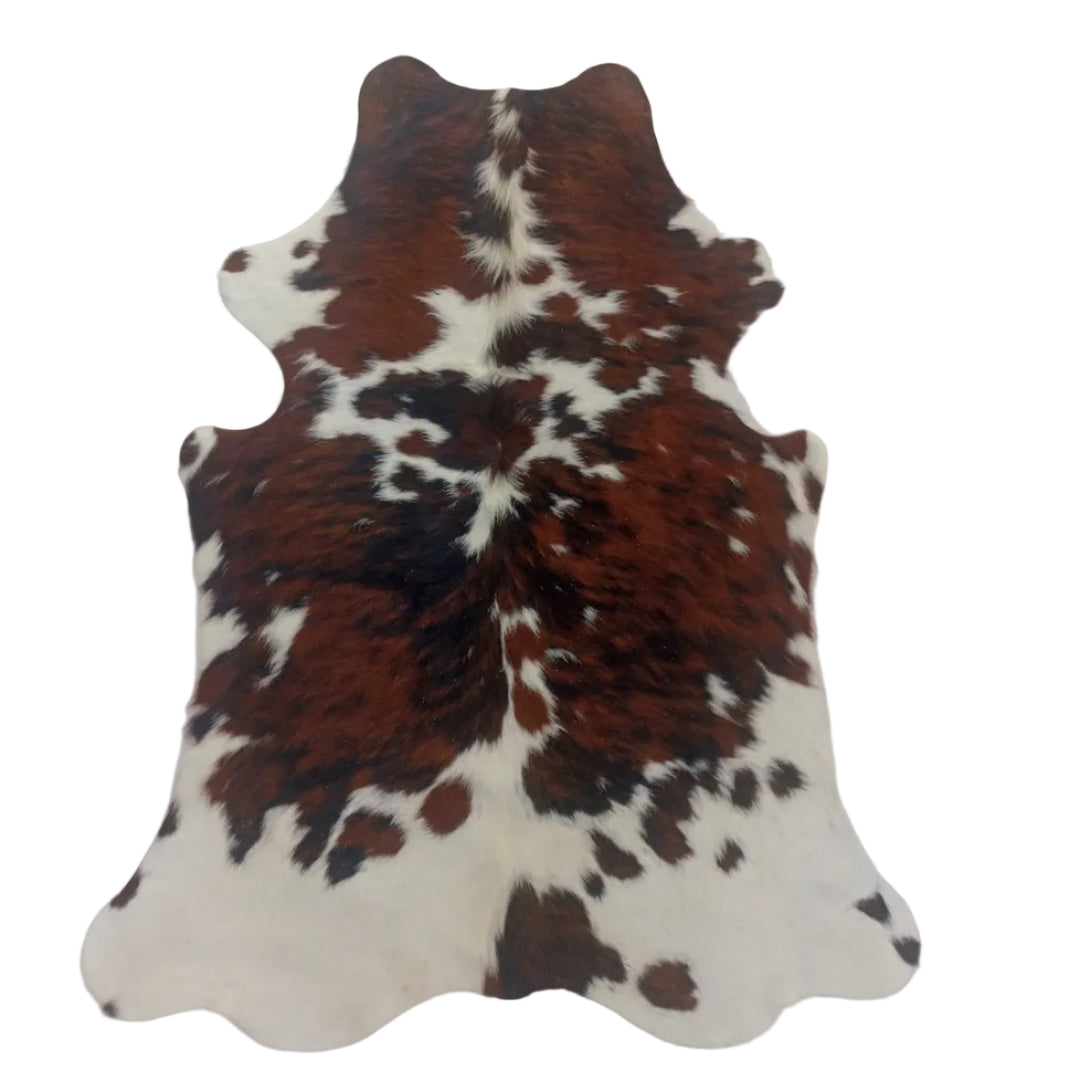 Premium cowhide rug from Cowhide Rugs London, 165cm x 131cm, natural cowhide with distinctive markings and soft texture.
