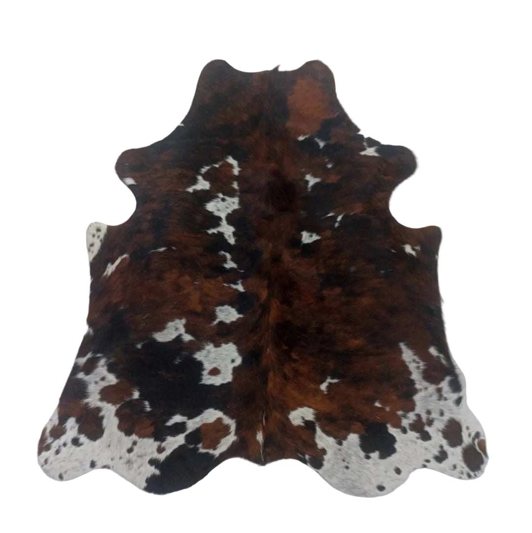 Cowhide rug with brown, white, and black 