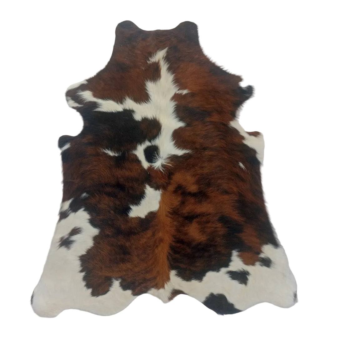 Premium cowhide rug from Cowhide Rugs London, natural cowhide with unique pattern, size 160cm x 136cm, high-quality animal hide decor.