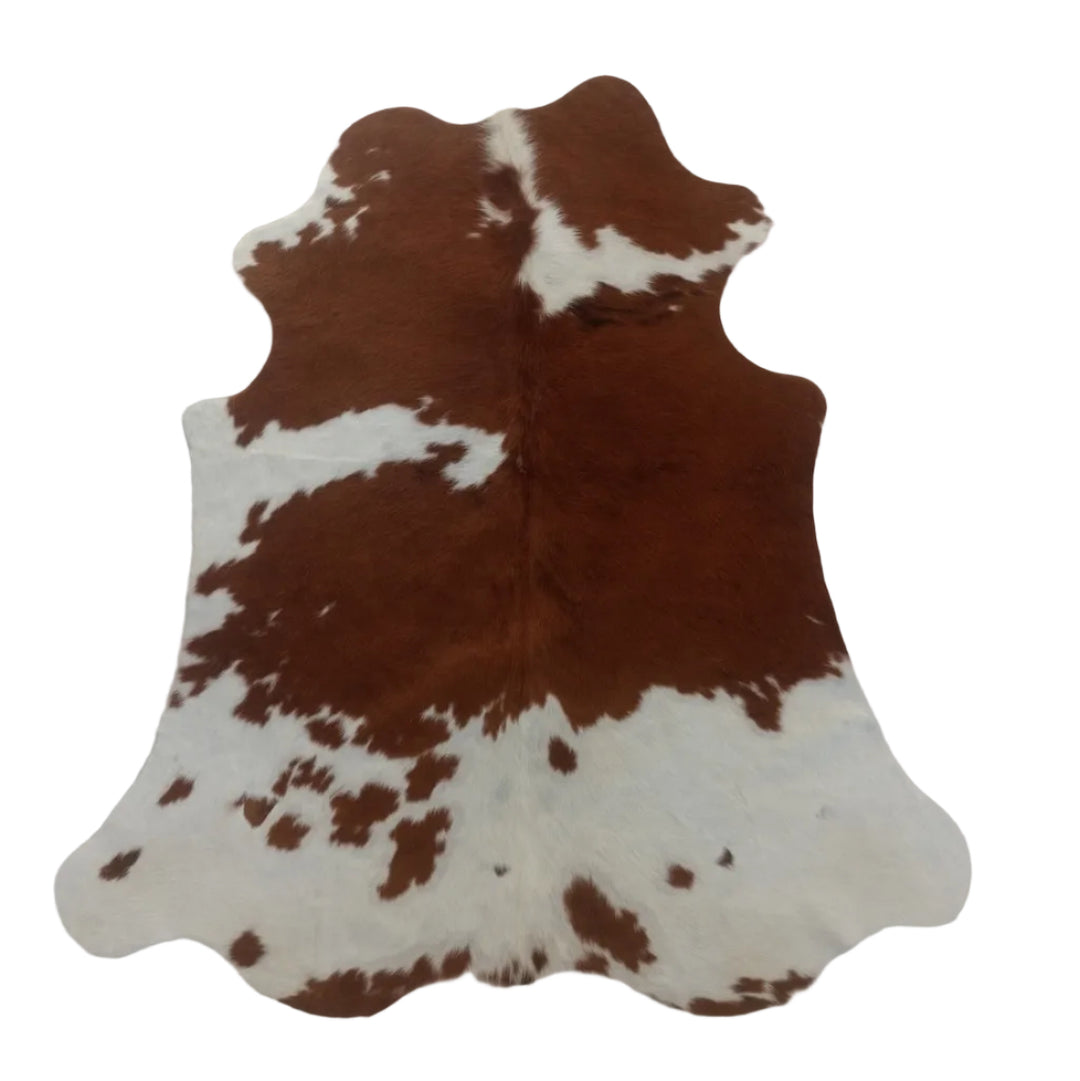 Brown and white cowhide rug 