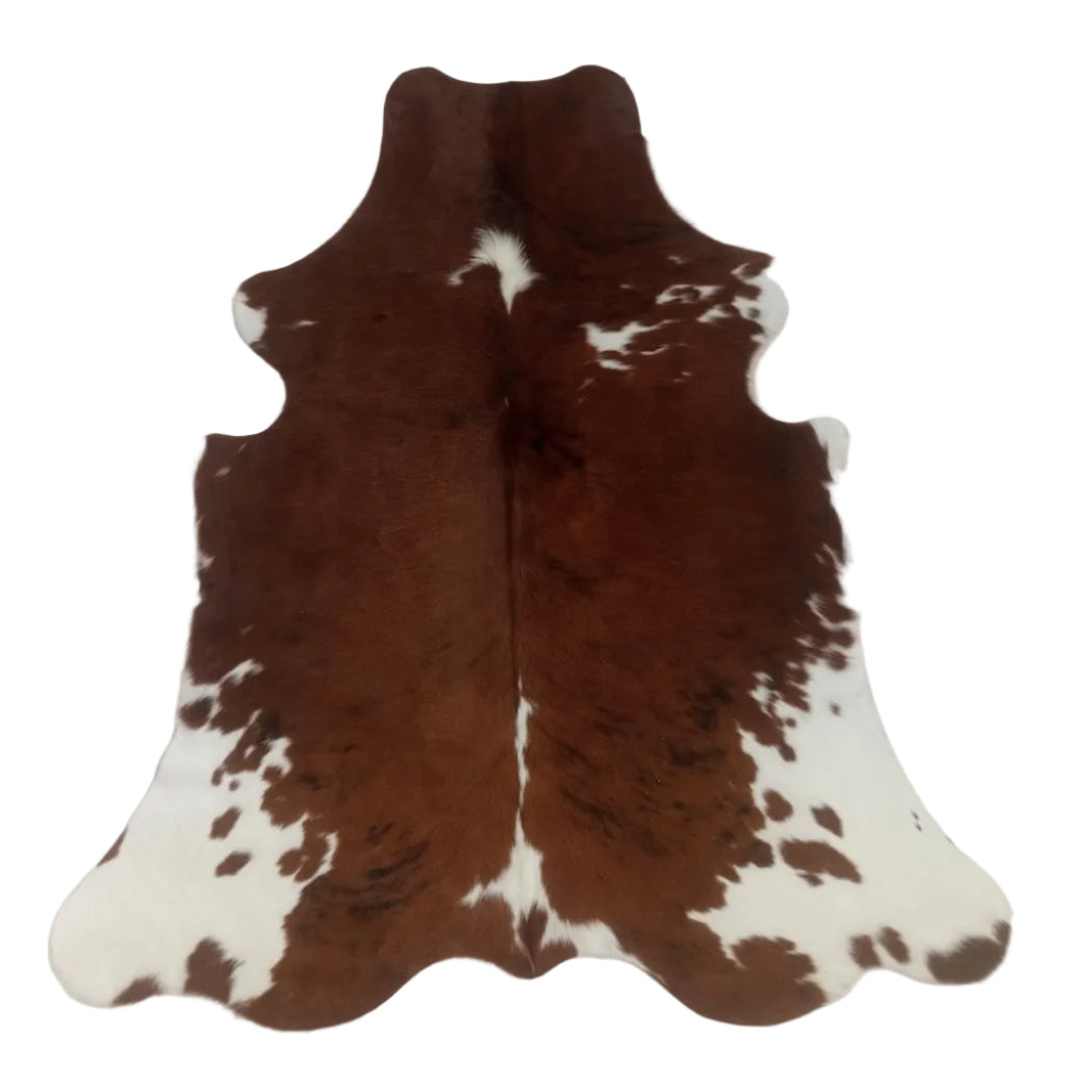 Brown and white cowhide rug o
