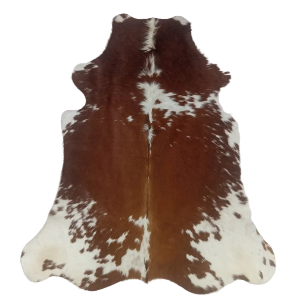 Brown and white cowhide rug 