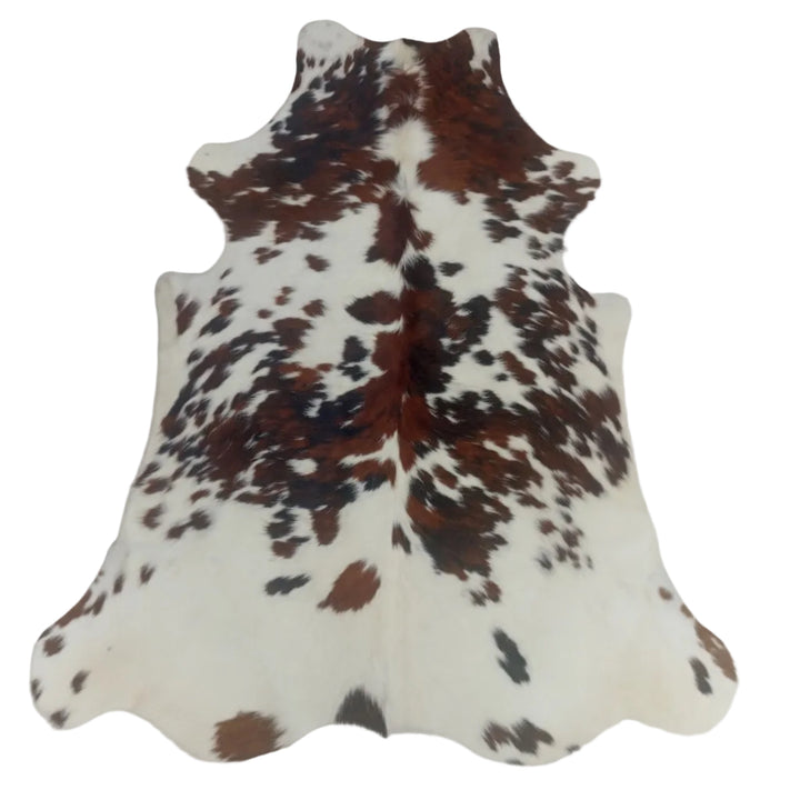 Brown and white cowhide rug 