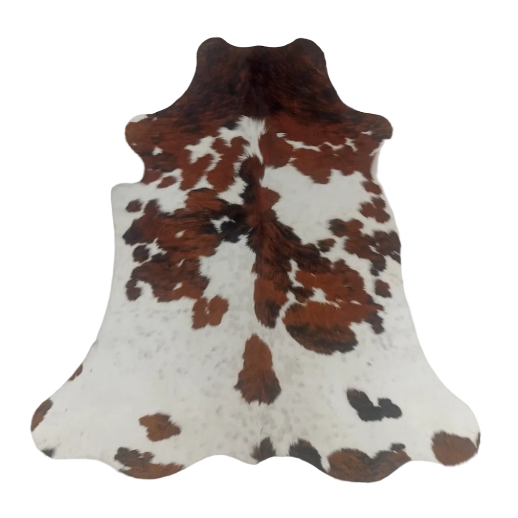 Brown and white cowhide rug 