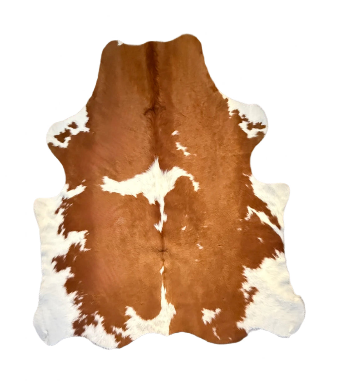 Brown and white cowhide rug small