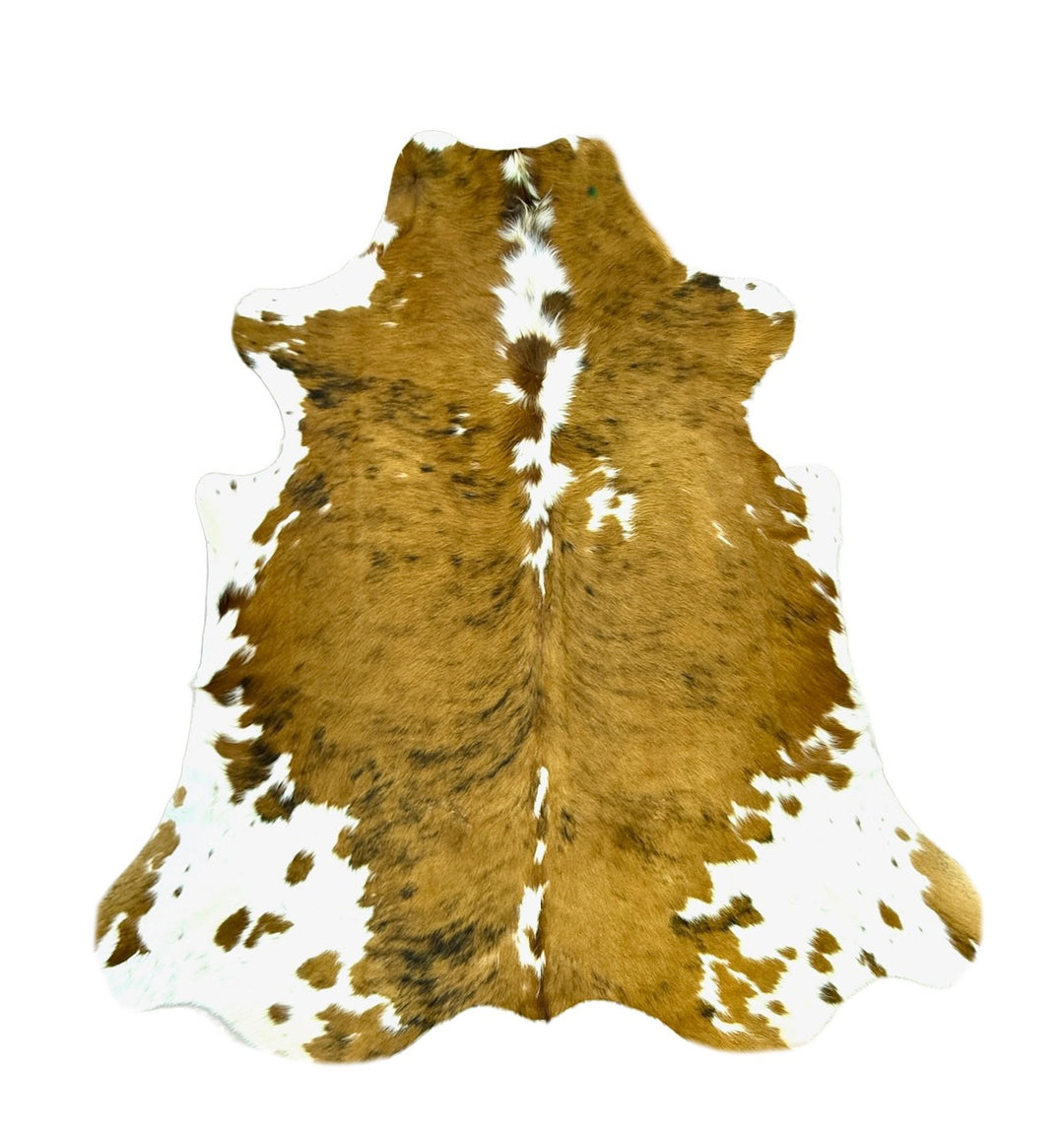 Brown and white cowhide rug 