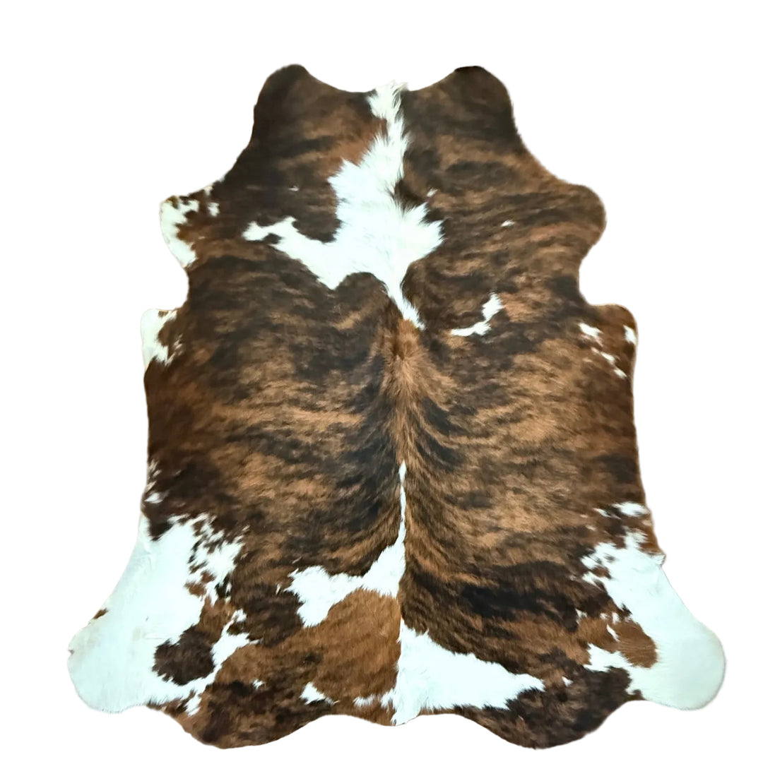 Brown and white cowhide rug 