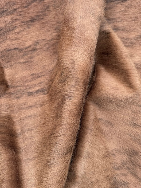 Large premium cowhide rug from Cowhide Rugs London, natural spotted pattern, measuring 241cm by 215cm, XXL size.